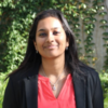 Headshot photo of Isha Dev, a Temple University Alum